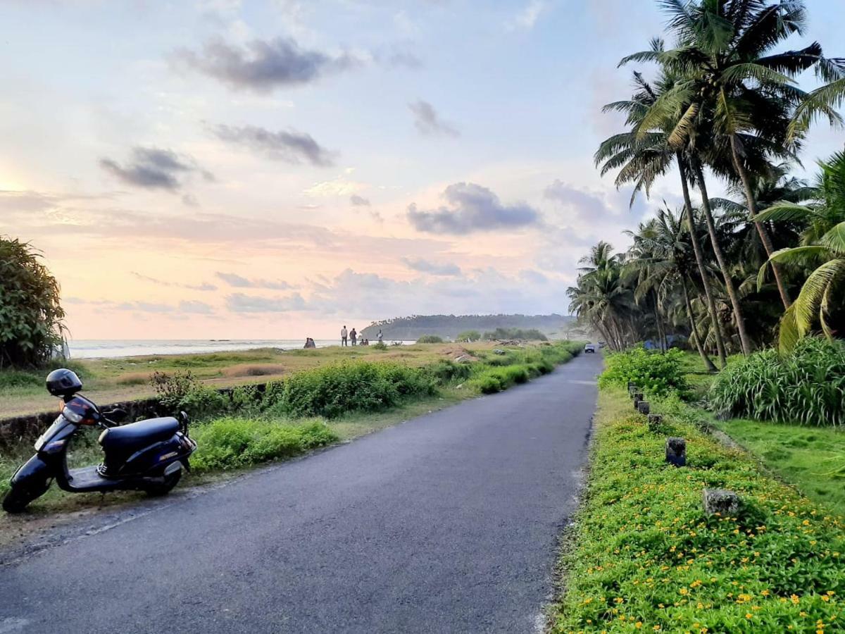 Corniche Beach Resort Mulappilangād Buitenkant foto
