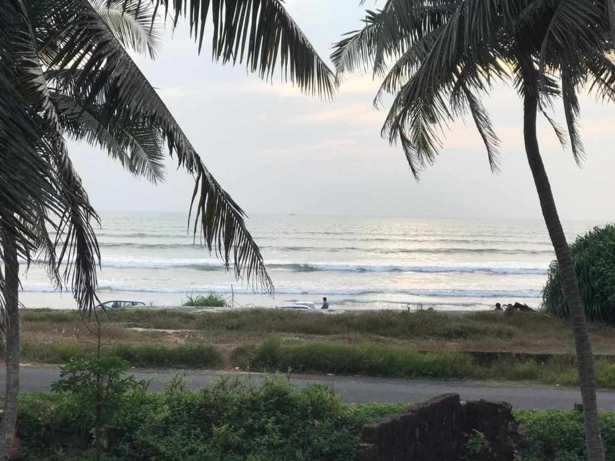 Corniche Beach Resort Mulappilangād Buitenkant foto